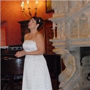 Soprano profesional, coach vocal, interpretación estilística y rehabilitación vocal